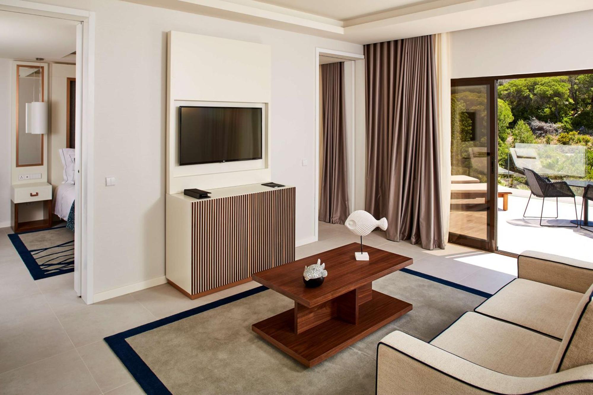 ホテル チボリ カルボエイロ カルヴォエイロ エクステリア 写真 A living room at the Four Seasons Hotel